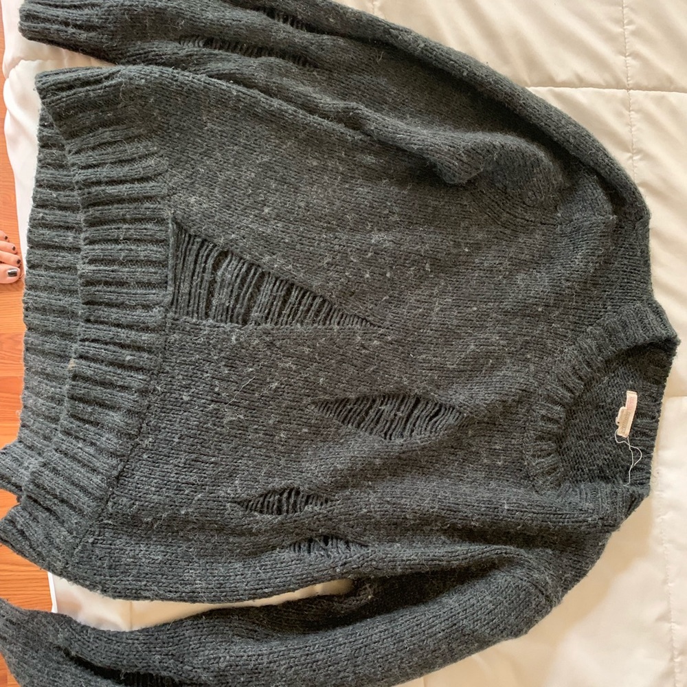 Ripped up fuzzy grey sweater
